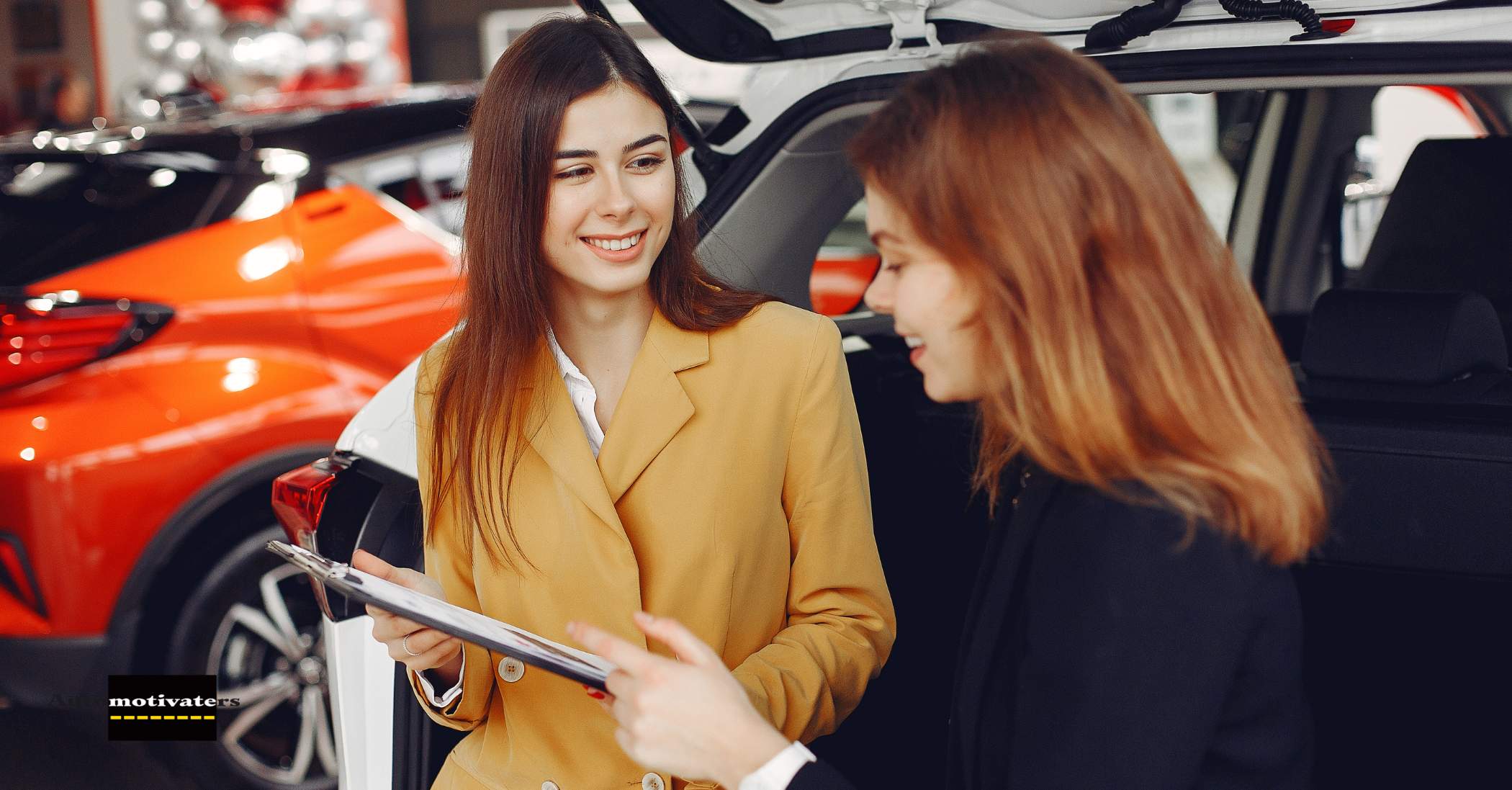 A sales consultant and a satisfied customer shaking hands