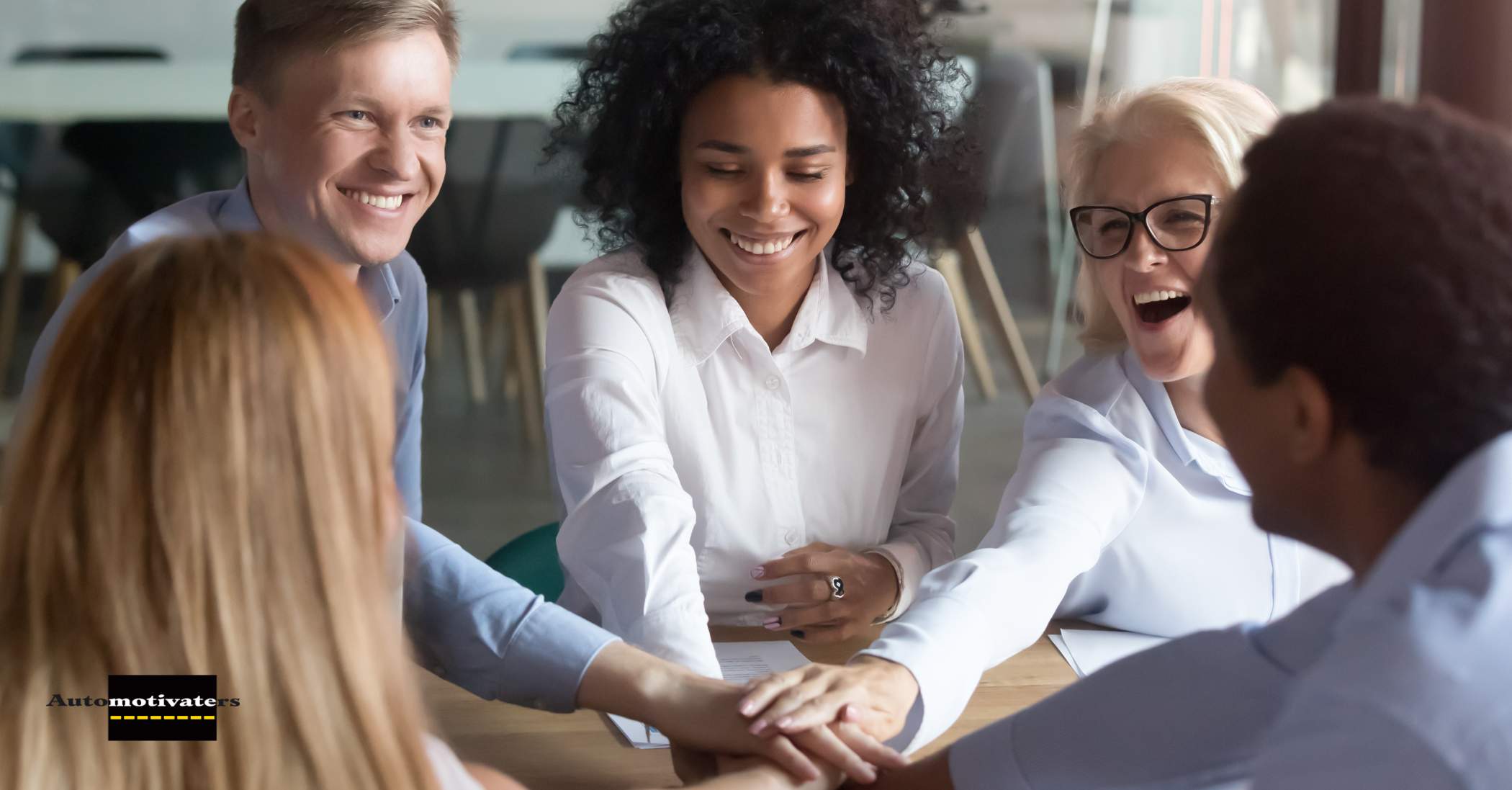 A manager engaging with employees in a team-building activity