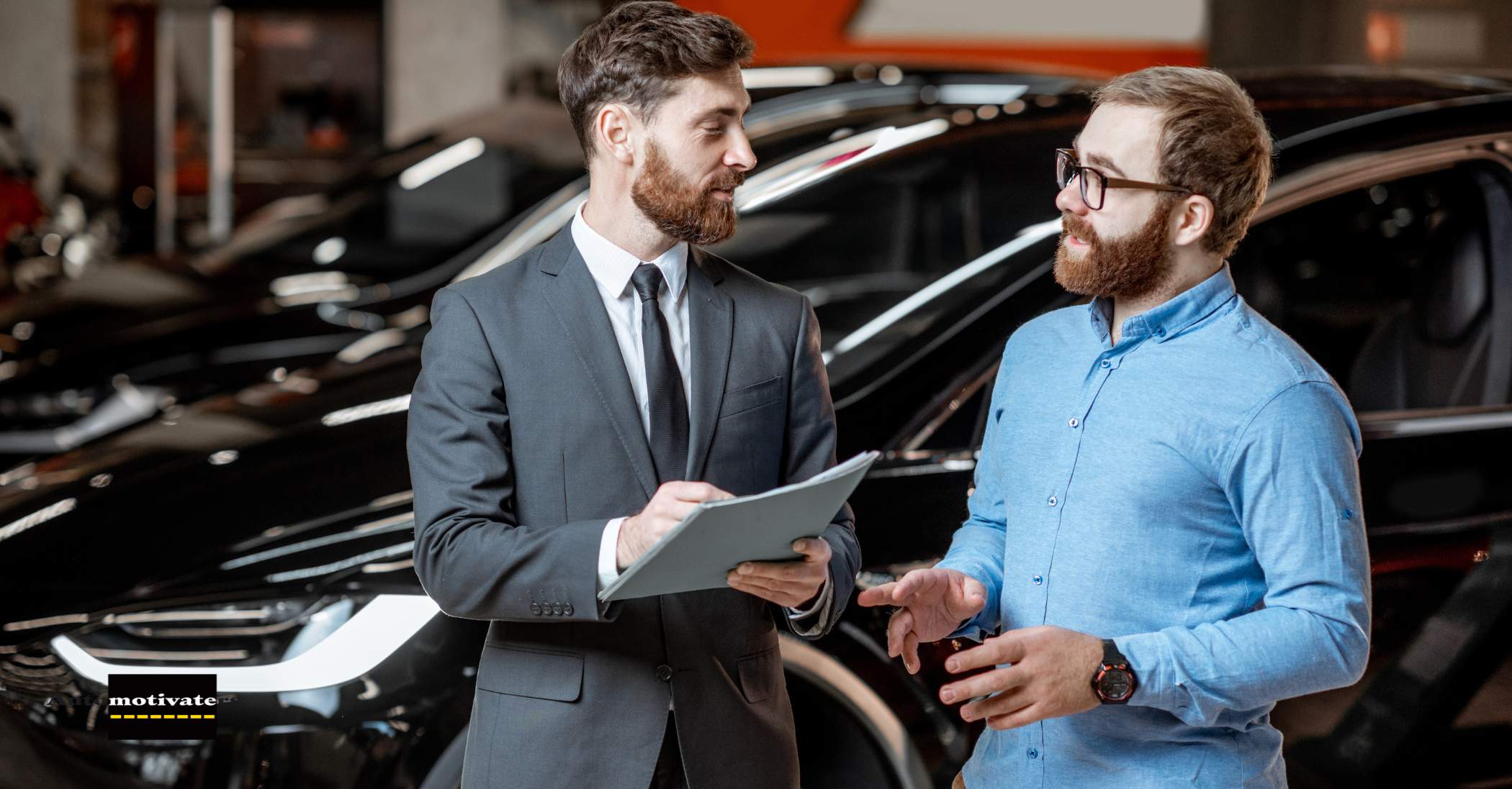 A sales consultant assisting a customer at a dealership