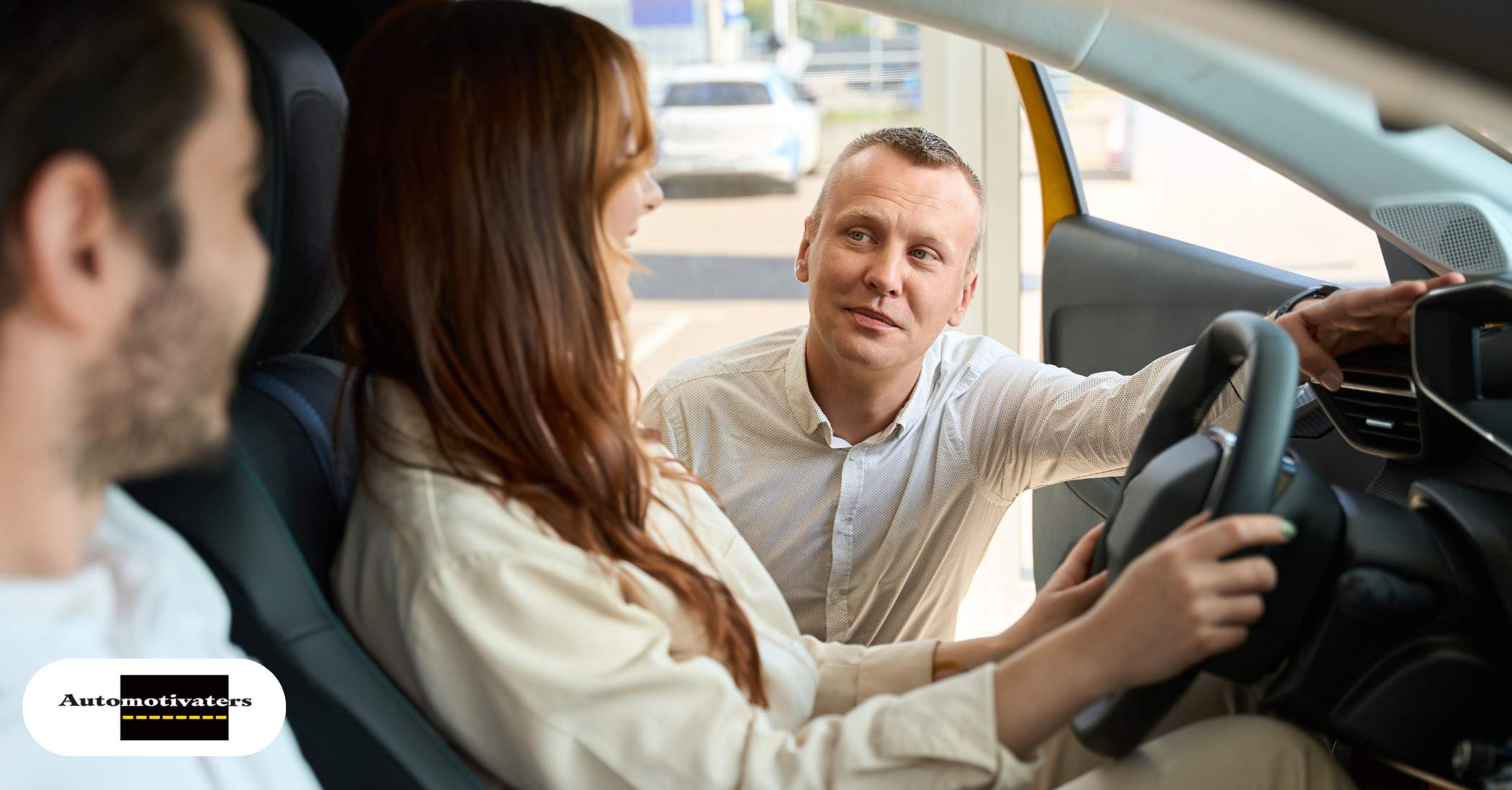 Sales consultant guiding a customer through a test drive