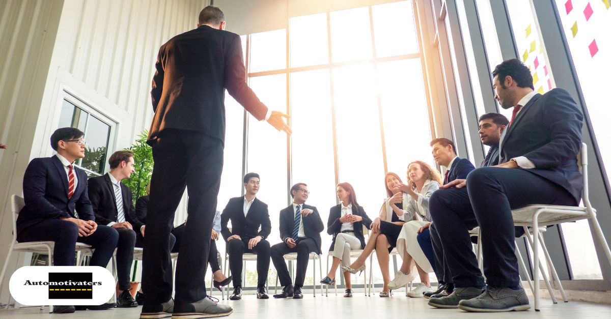 Team leader coaching service advisors in a small group setting