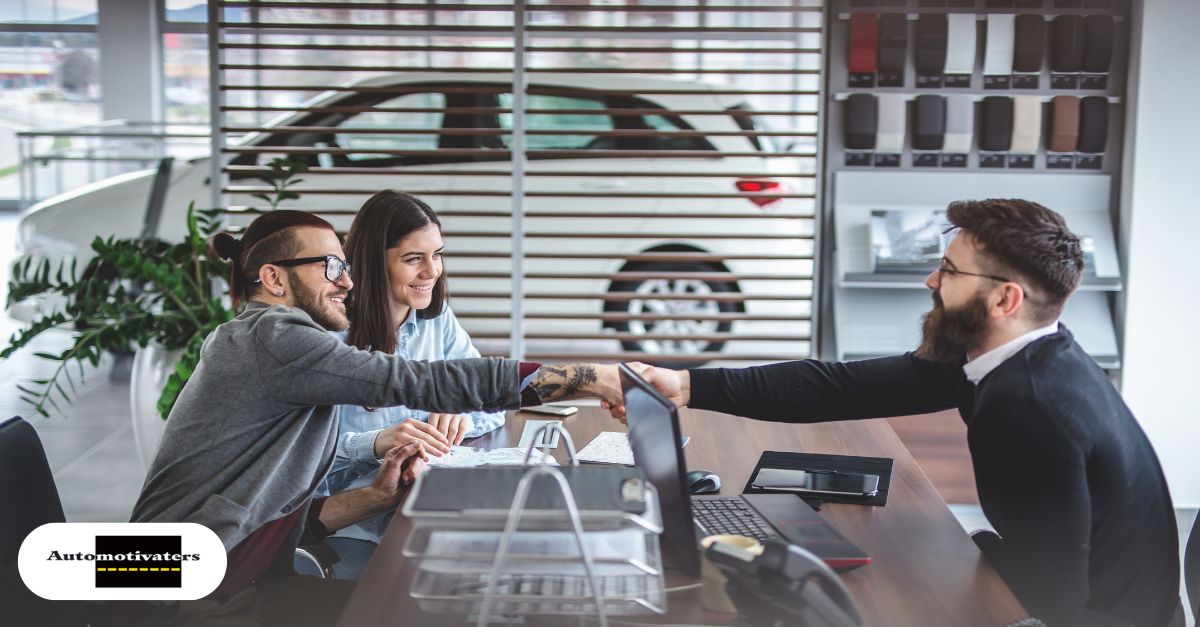 Service advisor and sales manager reviewing vehicle history